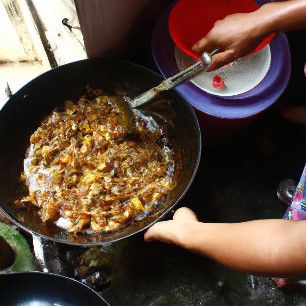 Person cooking adobong pusit dish