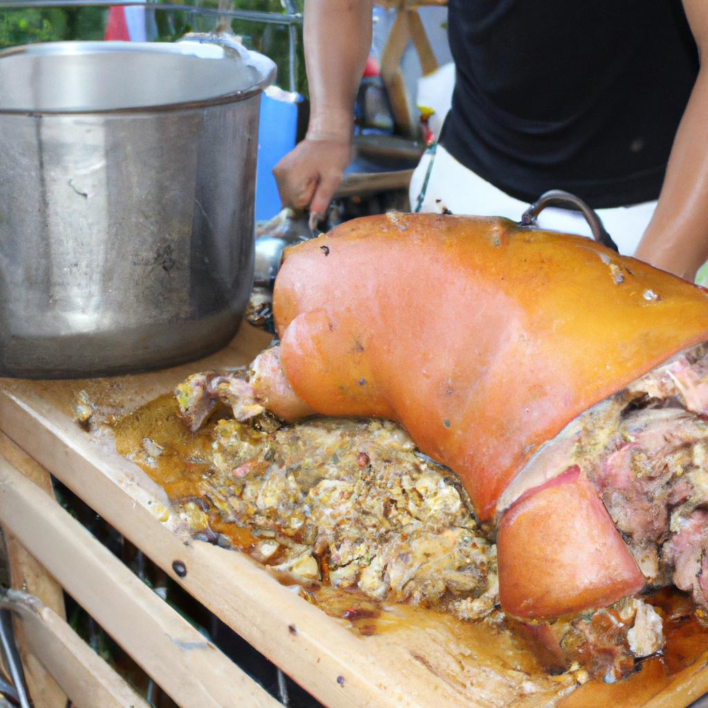Person preparing roasted pig dish